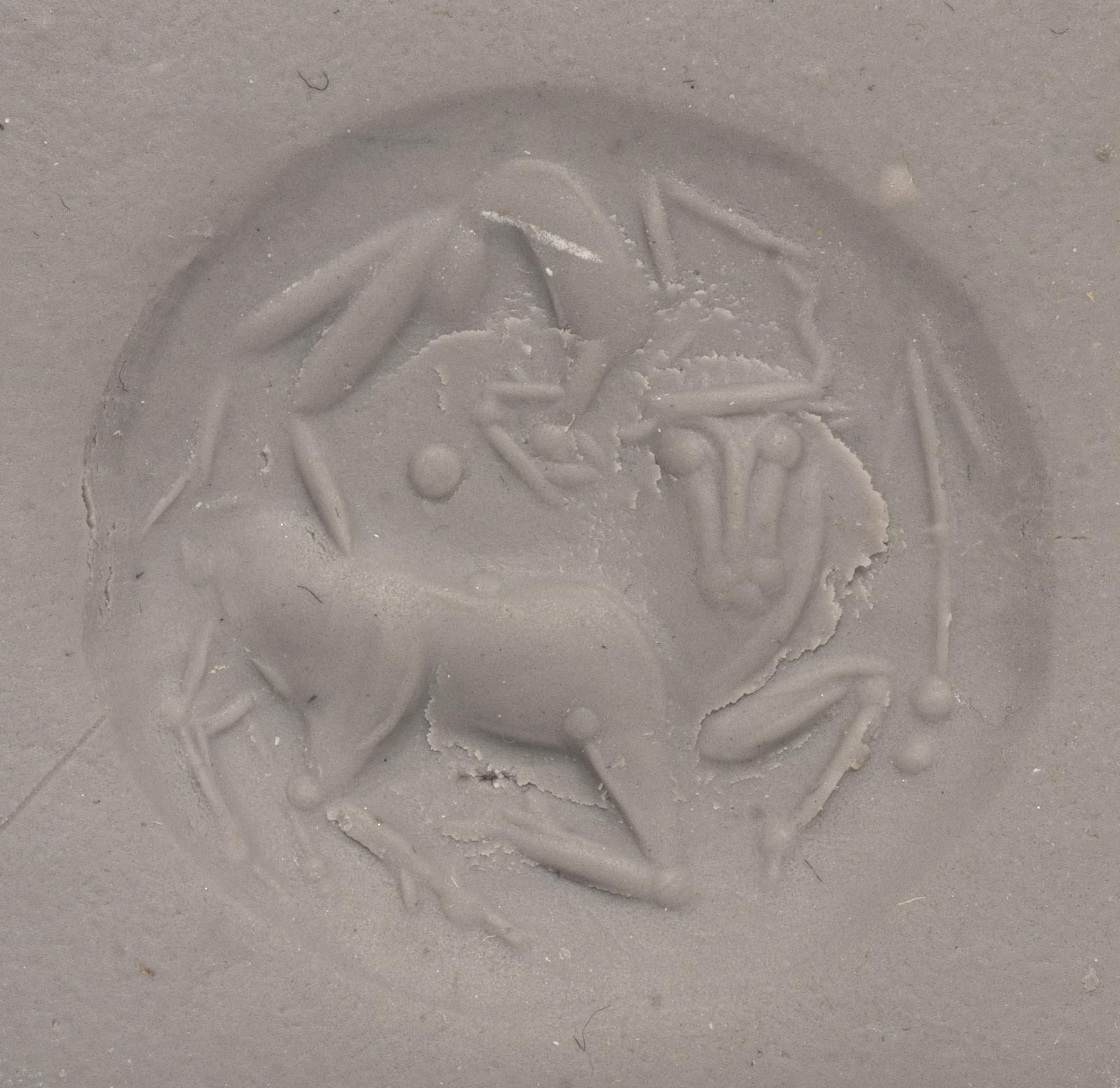A Minoan Banded Agate Lentoid with an Acrobat Leaping Over a Bull