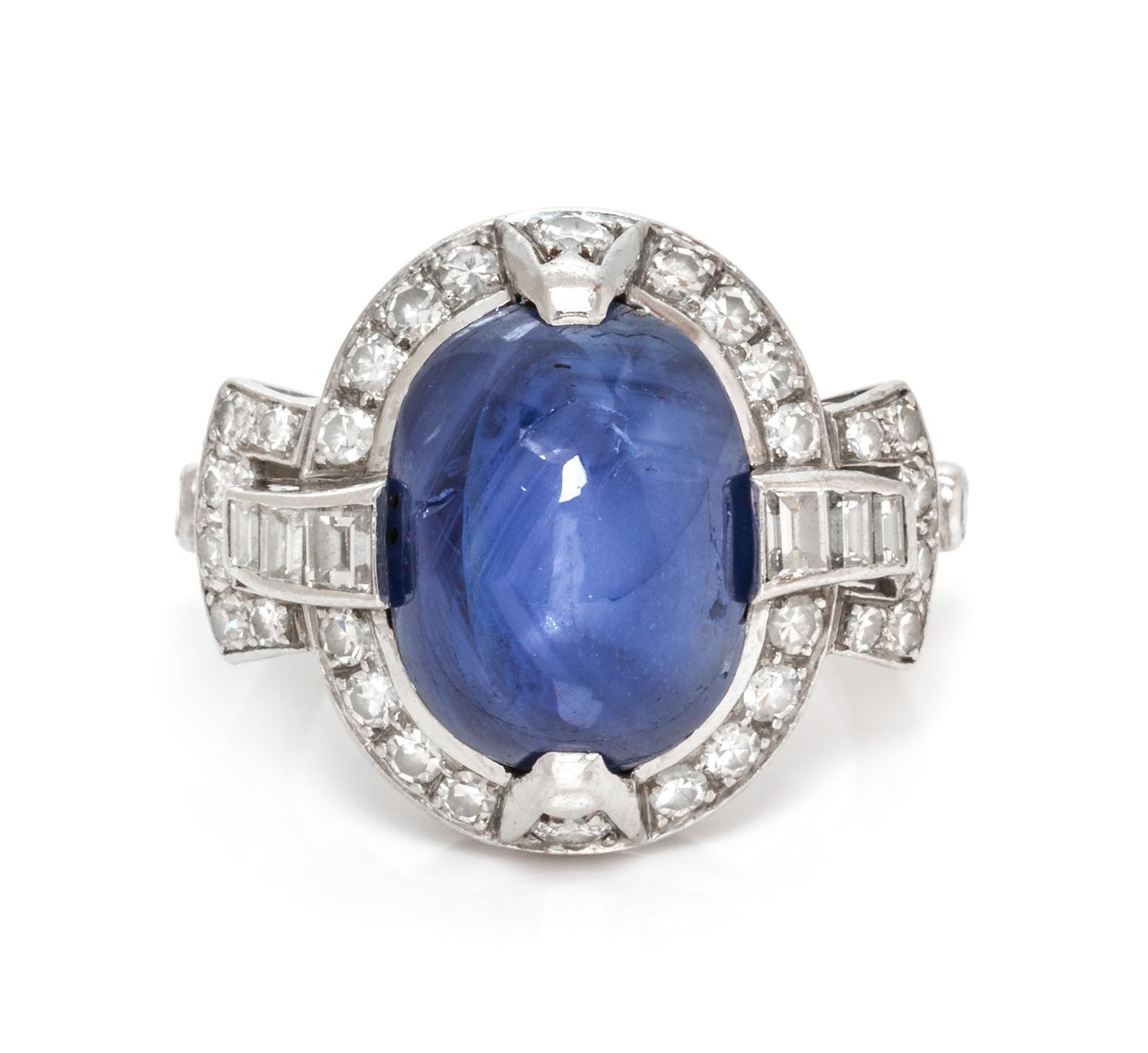 An Art Deco Platinum, Sapphire and Diamond Ring, 5.80 dwts.