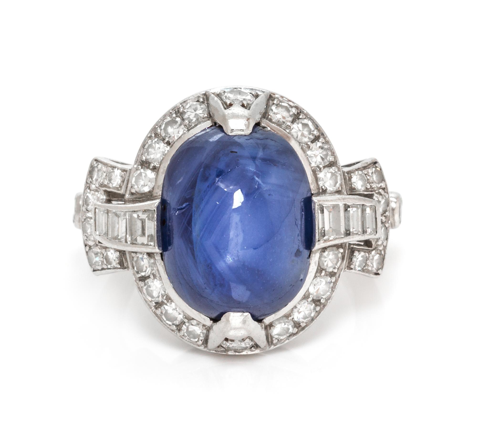 An Art Deco Platinum, Sapphire and Diamond Ring, 5.80 dwts.