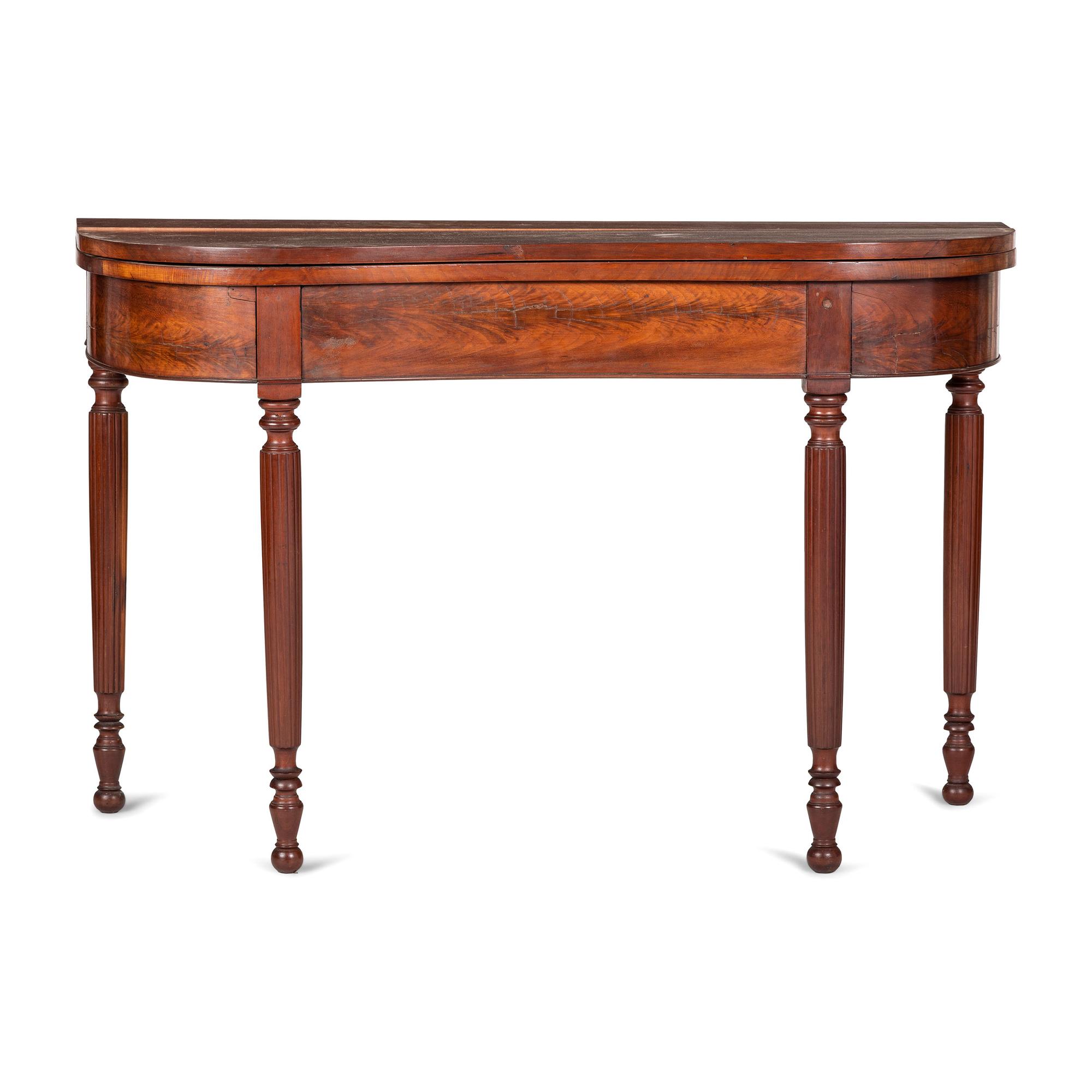 A Classical Figured Mahogany Shaped-Top Games Table