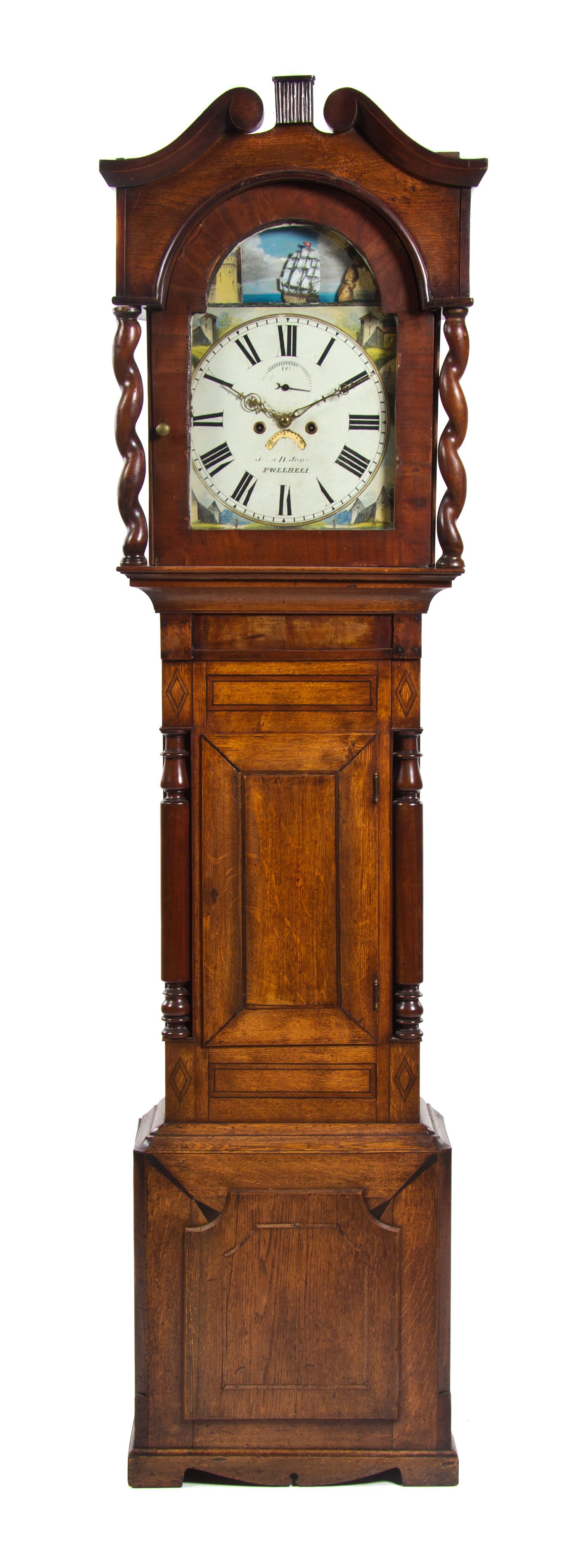 An English Oak Tall Case Clock, 19TH CENTURY, JOHN D JONES, PWLLHELI, Height 84 inches. — 19TH CENTURY, JOHN D JONES, PWLLHELI,