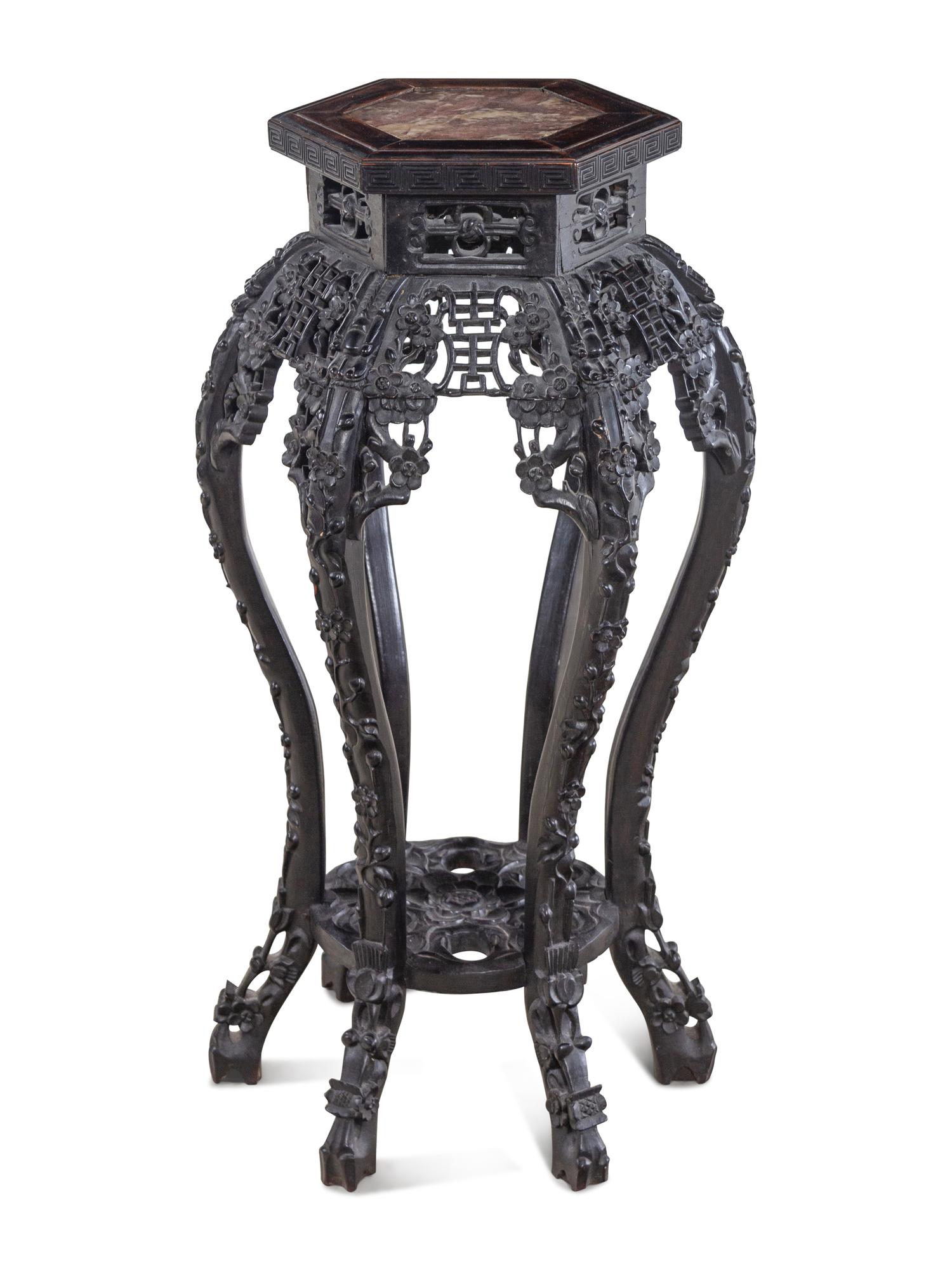 A Chinese Carved Hardwood and Marble-Inset Pedestal Table