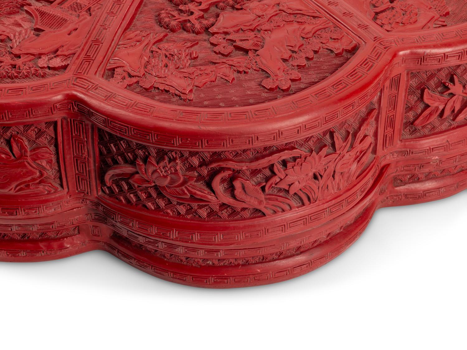 A Large Chinese Carved Red Lacquer Box and Cover