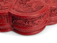A Large Chinese Carved Red Lacquer Box and Cover