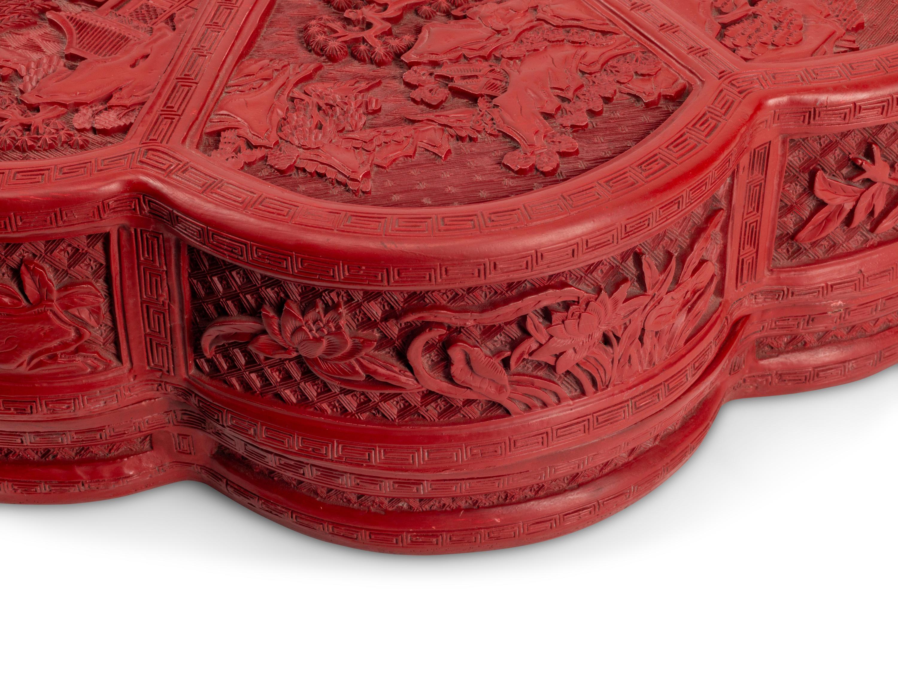 A Large Chinese Carved Red Lacquer Box and Cover
