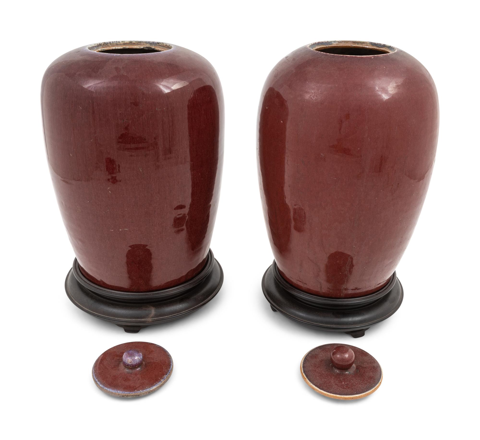 A Pair of Chinese Sang-de-Boeuf Porcelain Covered Jars