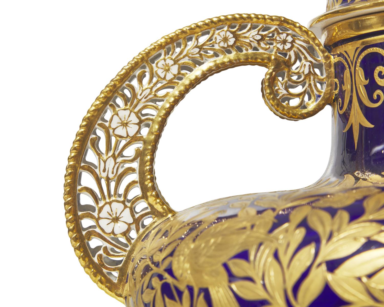A Royal Crown Derby Parcel Gilt Twin-Handled Vase and Cover