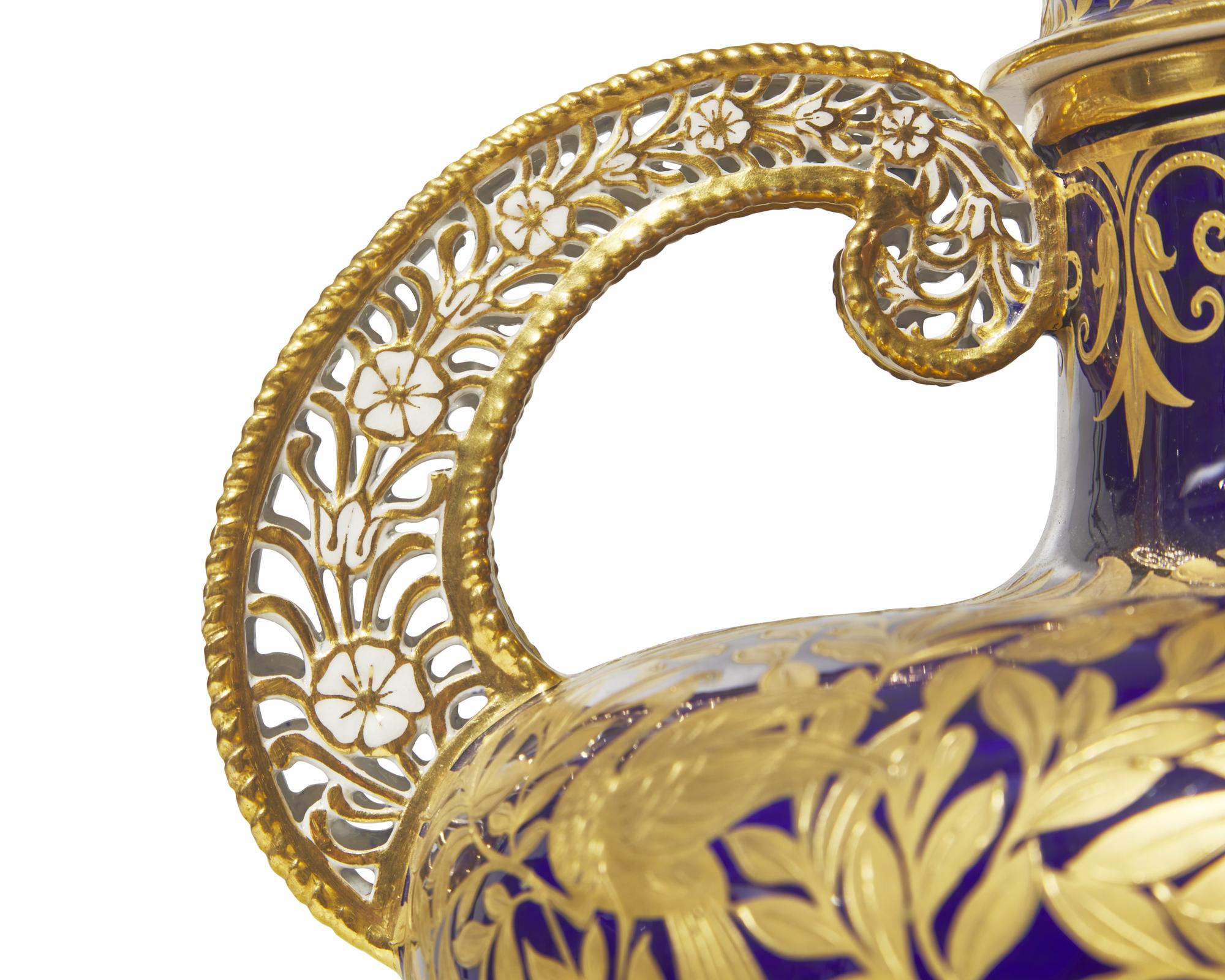 A Royal Crown Derby Parcel Gilt Twin-Handled Vase and Cover
