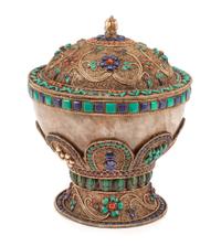 A Gilt Metal Filigree and Stone Mounted Rock Crystal Bowl and Cover Height 13 x diameter 10 1/2 inches.
