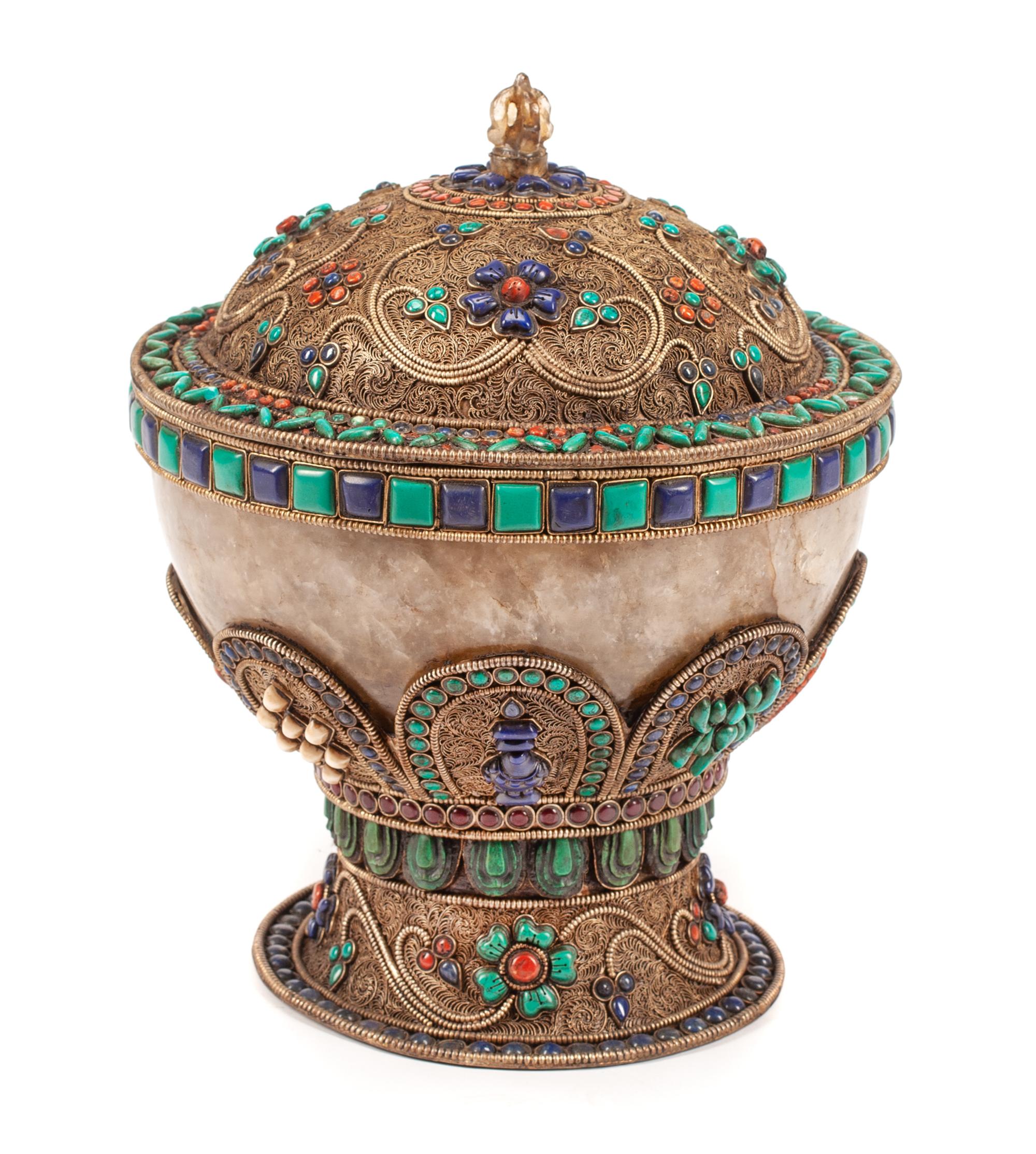 A Gilt Metal Filigree and Stone Mounted Rock Crystal Bowl and Cover Height 13 x diameter 10 1/2 inches.