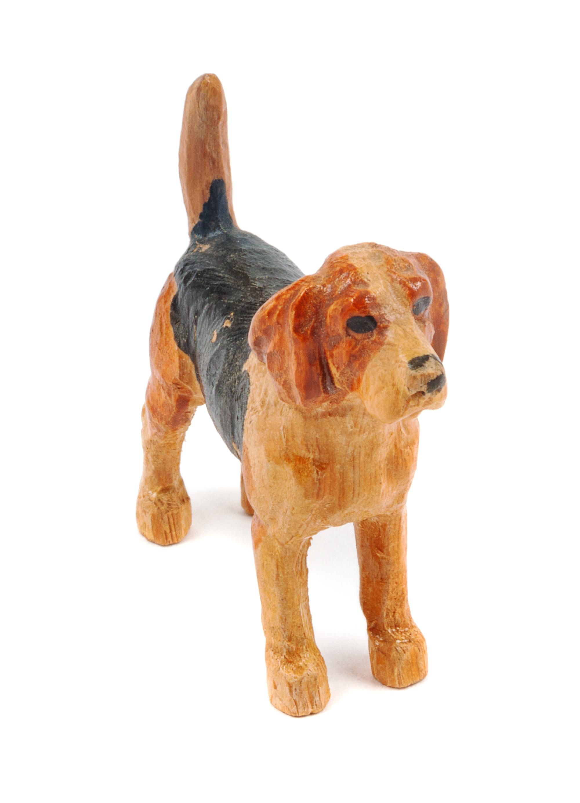 A Wooden Beagle Figure Height 1 5/8 inches.