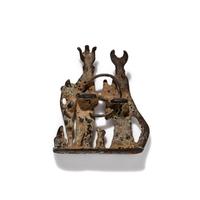 An Egyptian Silver Pendant with the Gods Isis and Harpocrates