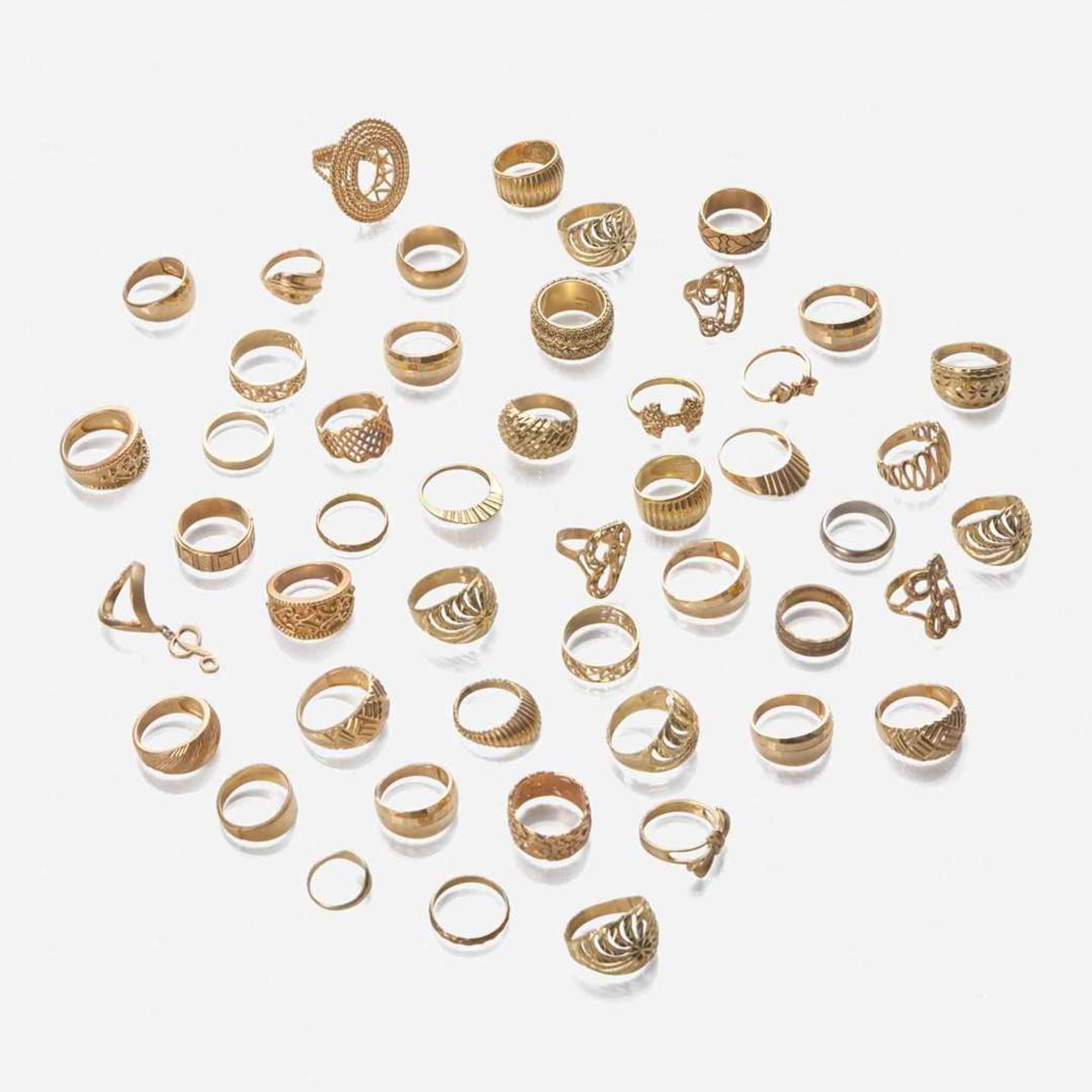 A Large Collection of 14K Gold Rings
