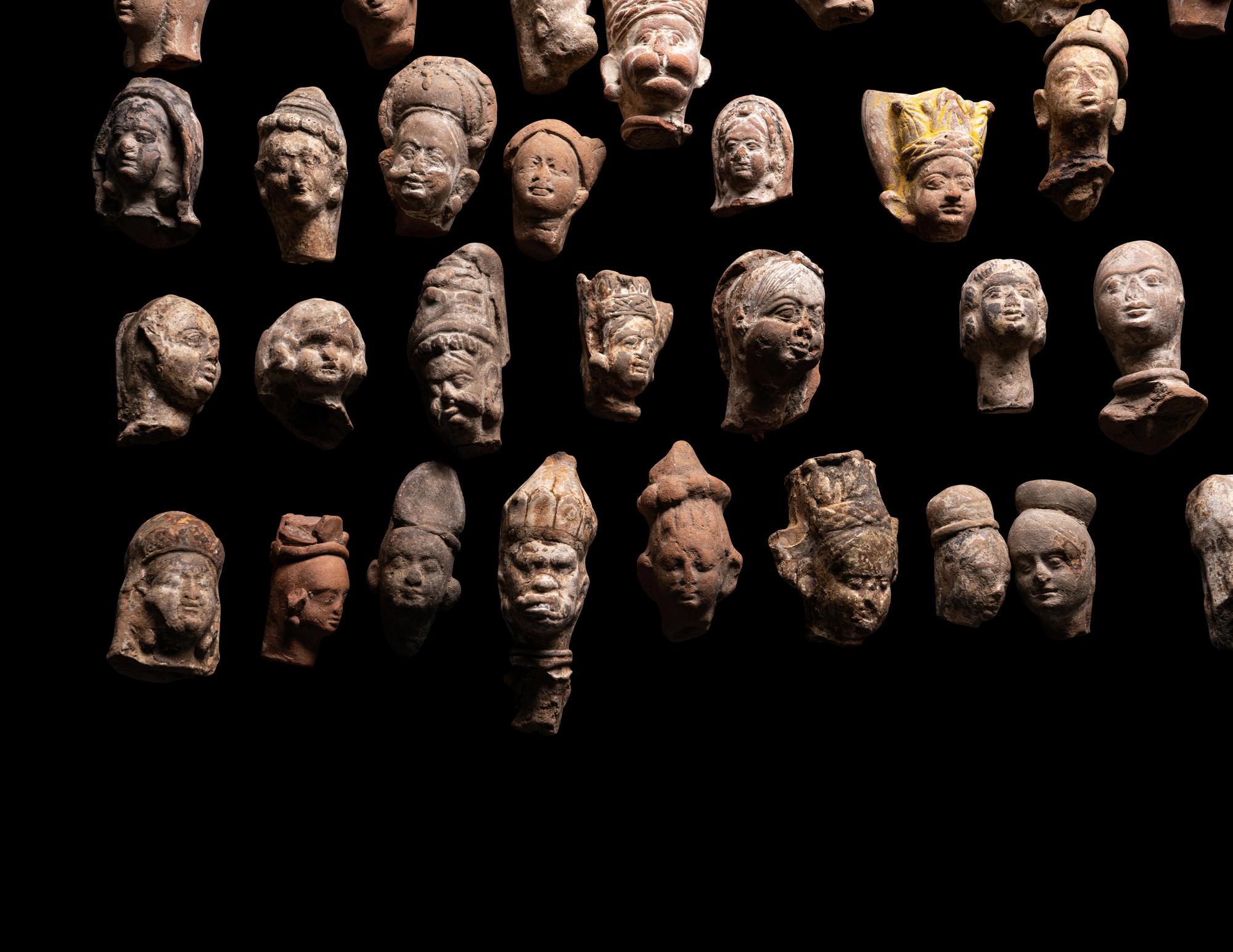 A Group of 65 Gandharan Terracotta Heads