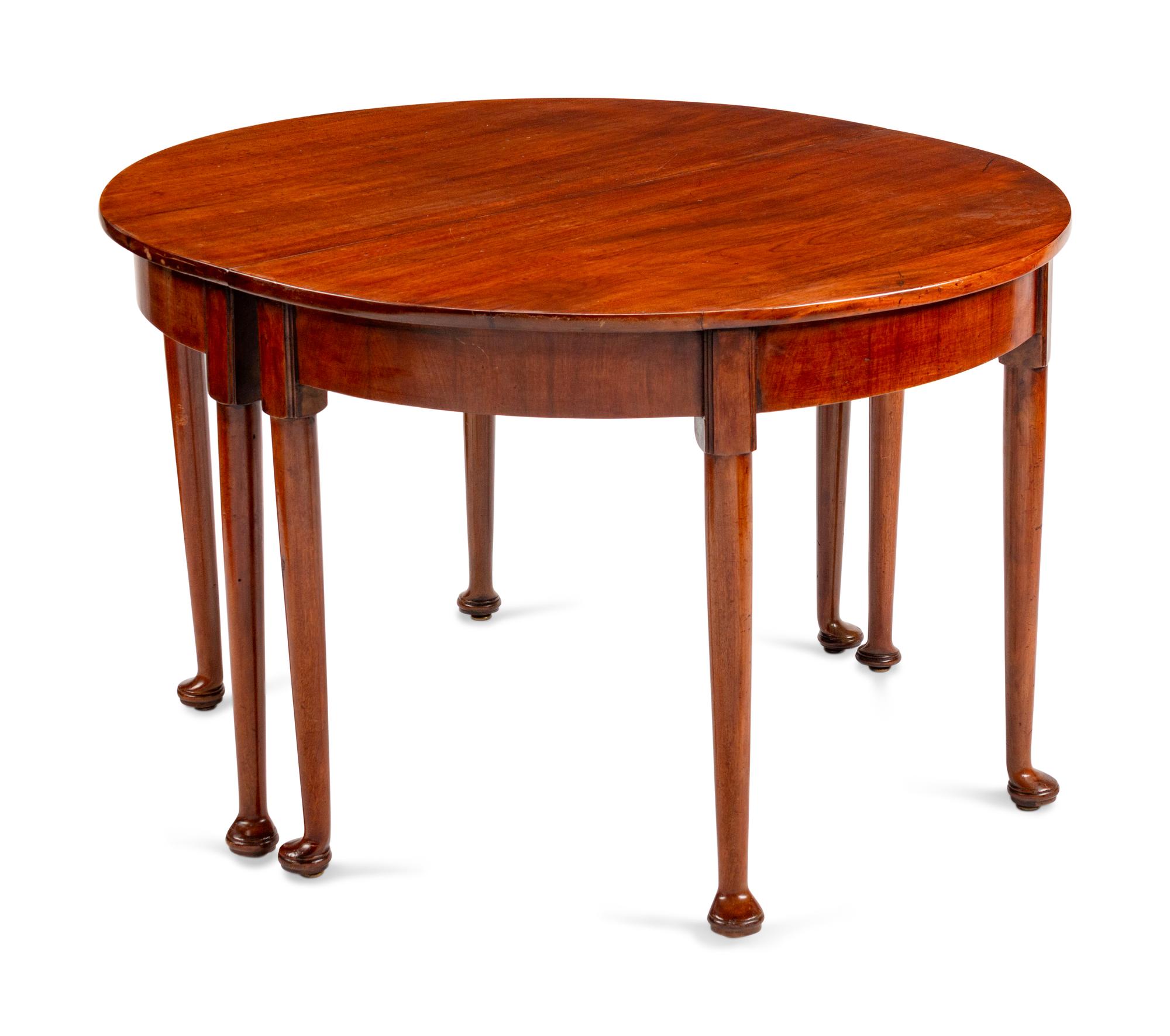 A Queen Anne Style Mahogany Oval Dining Table