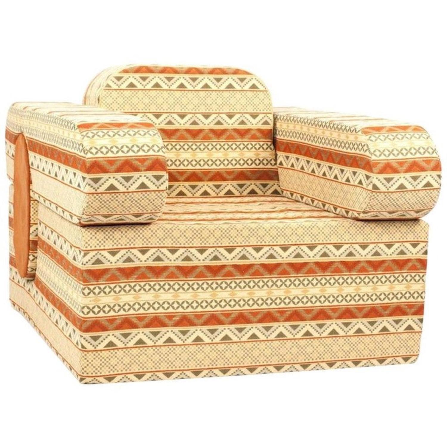 A Mid-Century Upholstered Puzzle Chair