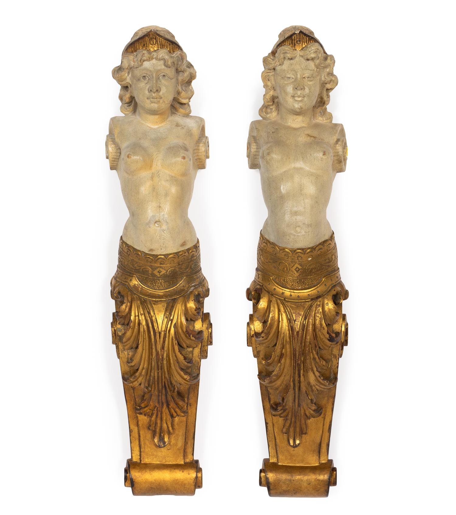 A Pair of Continental Carved Giltwood Caryatid Pilasters
