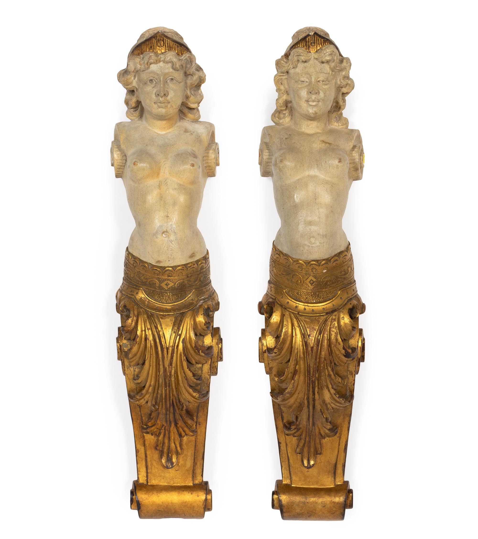 A Pair of Continental Carved Giltwood Caryatid Pilasters