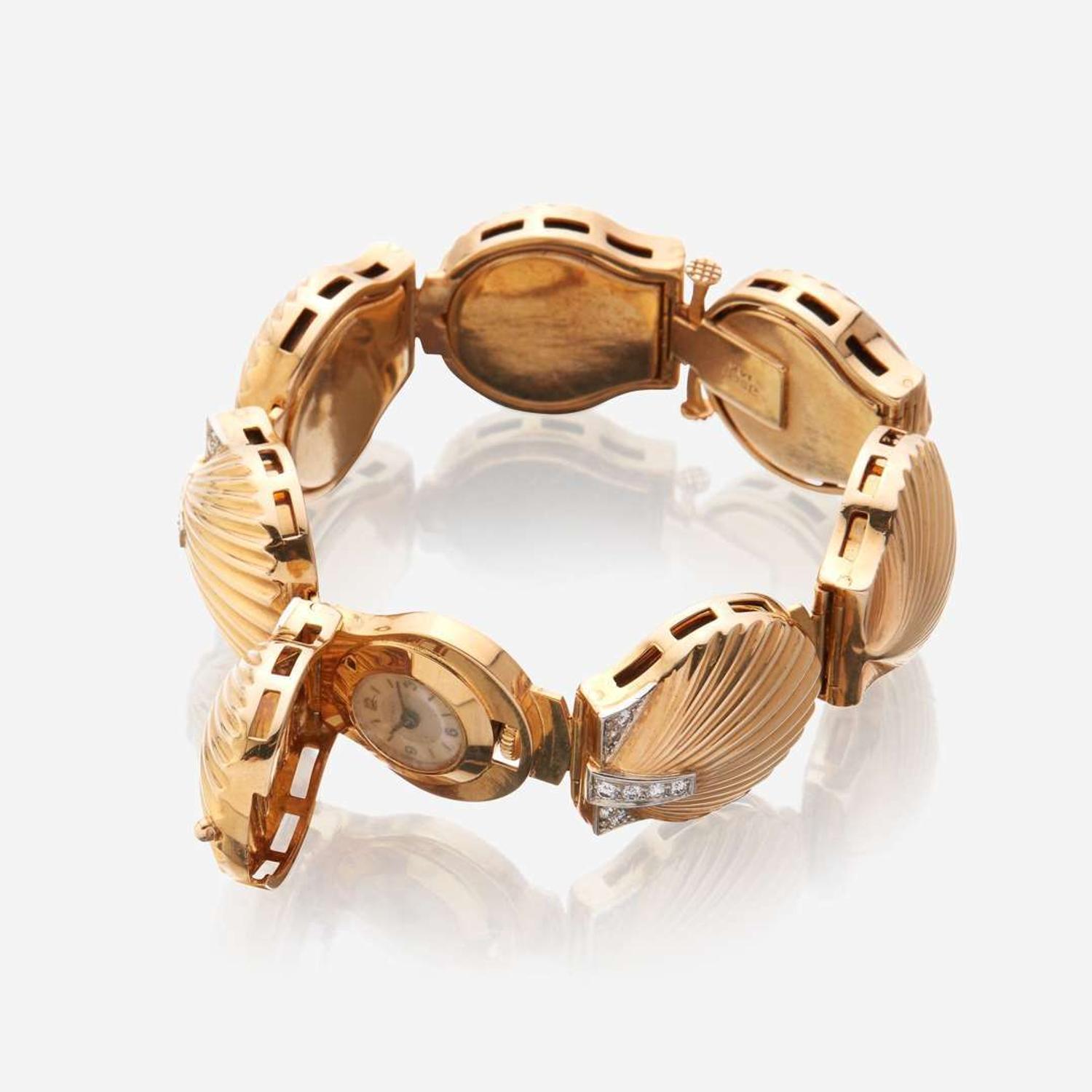 A fourteen karat gold and diamond bracelet watch, J. Schulz