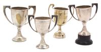 A Group of Four Diminutive Silver Plate Trophy Cups Height of tallest 5 3/4 inches. — 20TH CENTURY