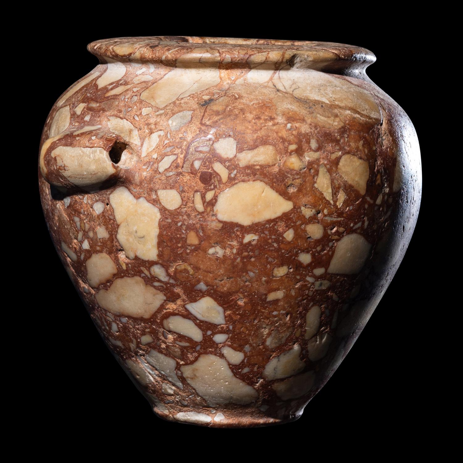 An Egyptian Breccia Jar