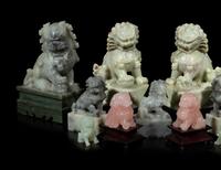 11 Chinese Figures of Seated Fu- Lions