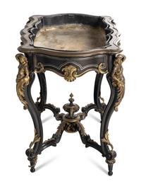 A Napoleon III Gilt Bronze Mounted Ebonized Jardinière Table