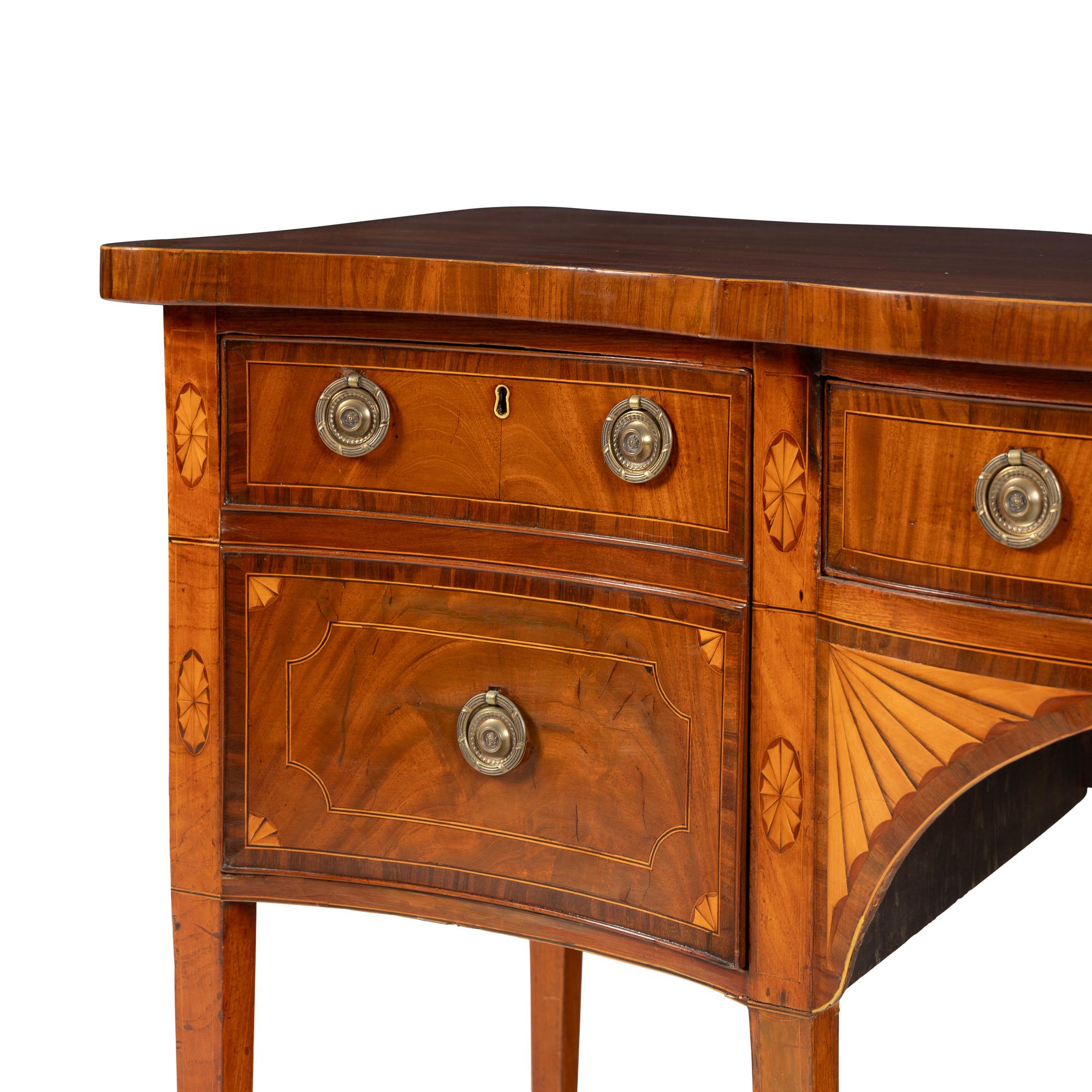 A George III Mahogany and Marquetry Serpentine Sideboard