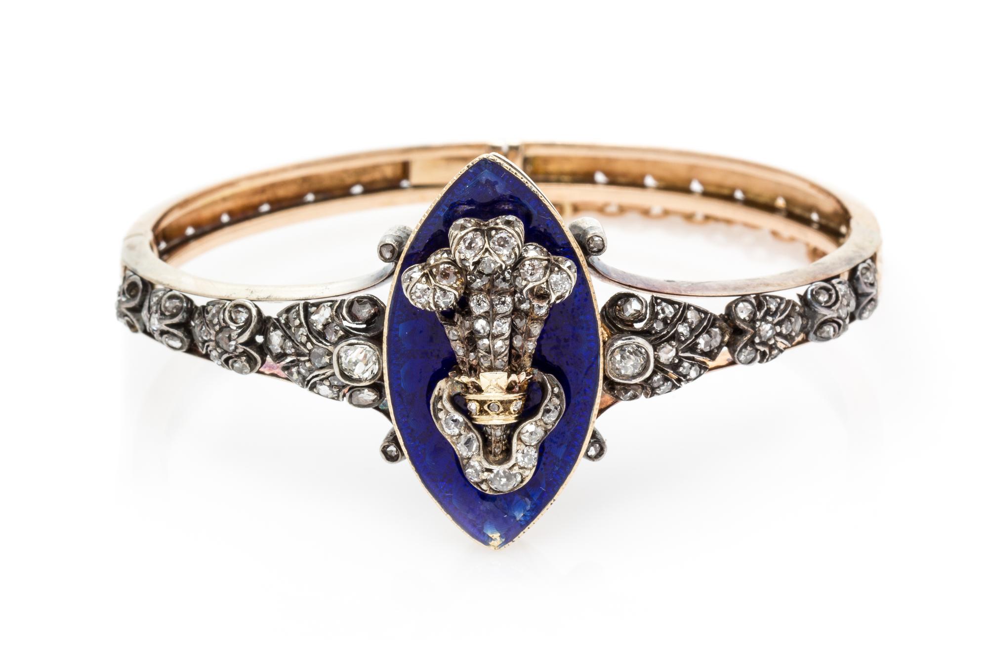 A Victorian Silver Topped Yellow Gold, Diamond and Enamel Bangle Bracelet, 17.35 dwts.