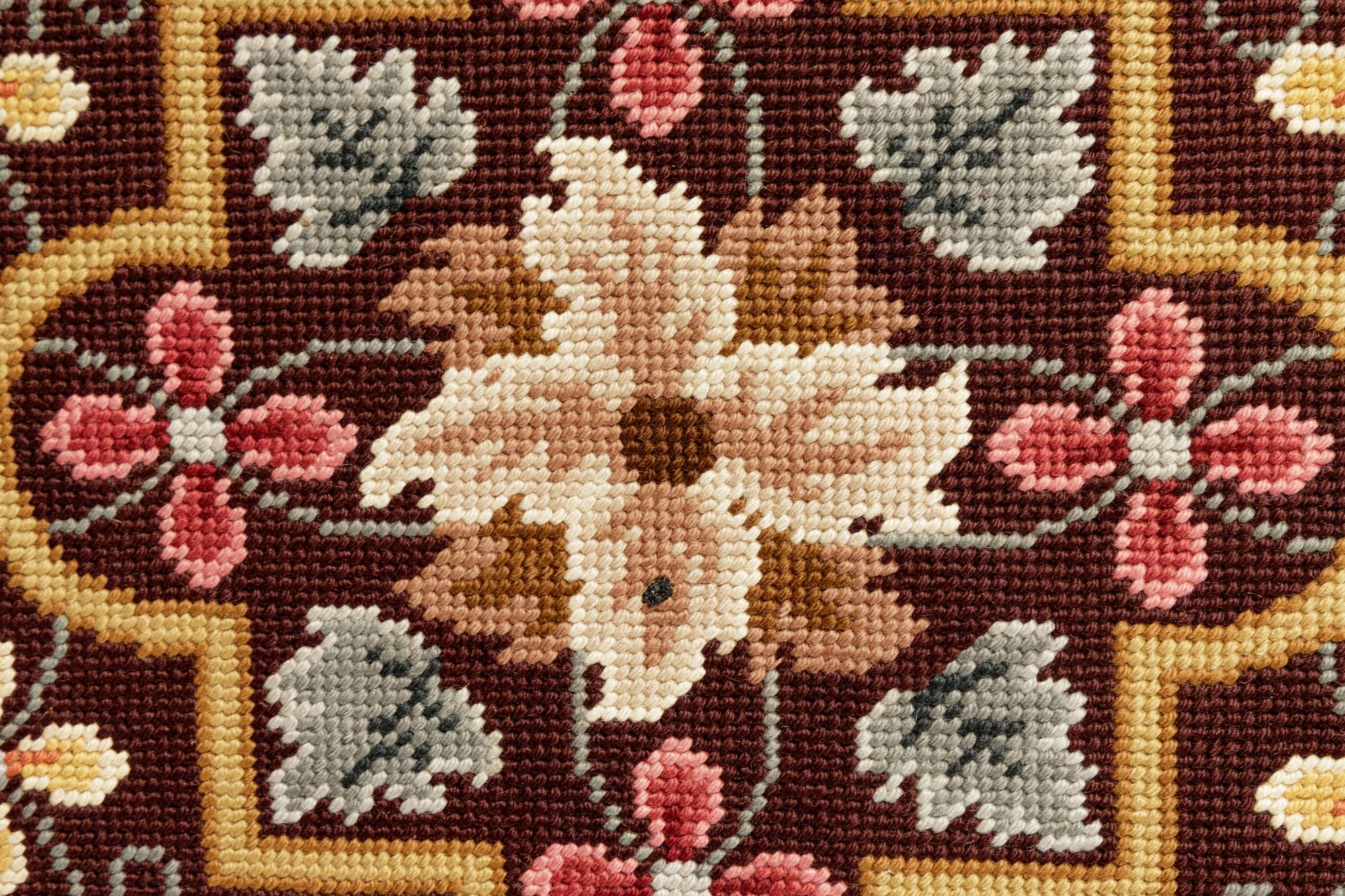 A Continental Needlepoint Rug
