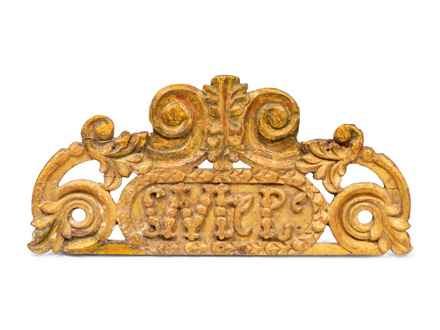 A Spanish Colonial Carved Wooden Plaque
