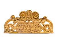 A Spanish Colonial Carved Wooden Plaque