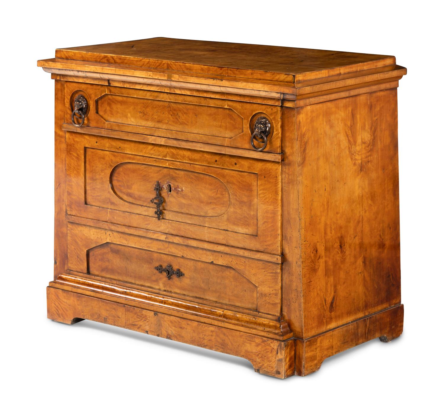 A Continental Figured Birch Commode