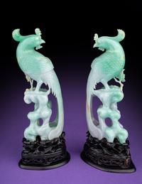 A Pair of Semi-Translucent Green Jadeite Figures of Phoenix