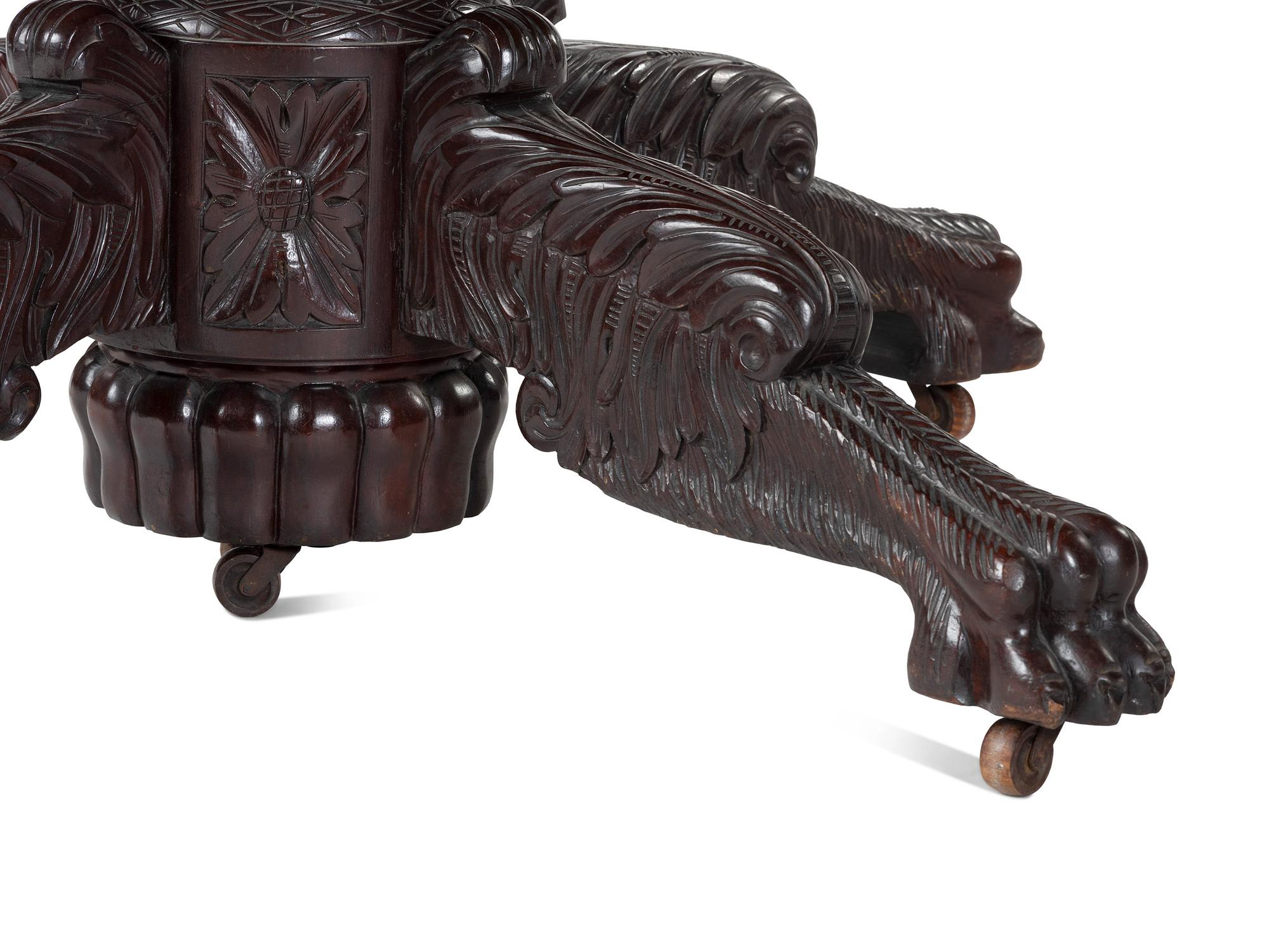 A Classical Carved Mahogany Extension Dining Table