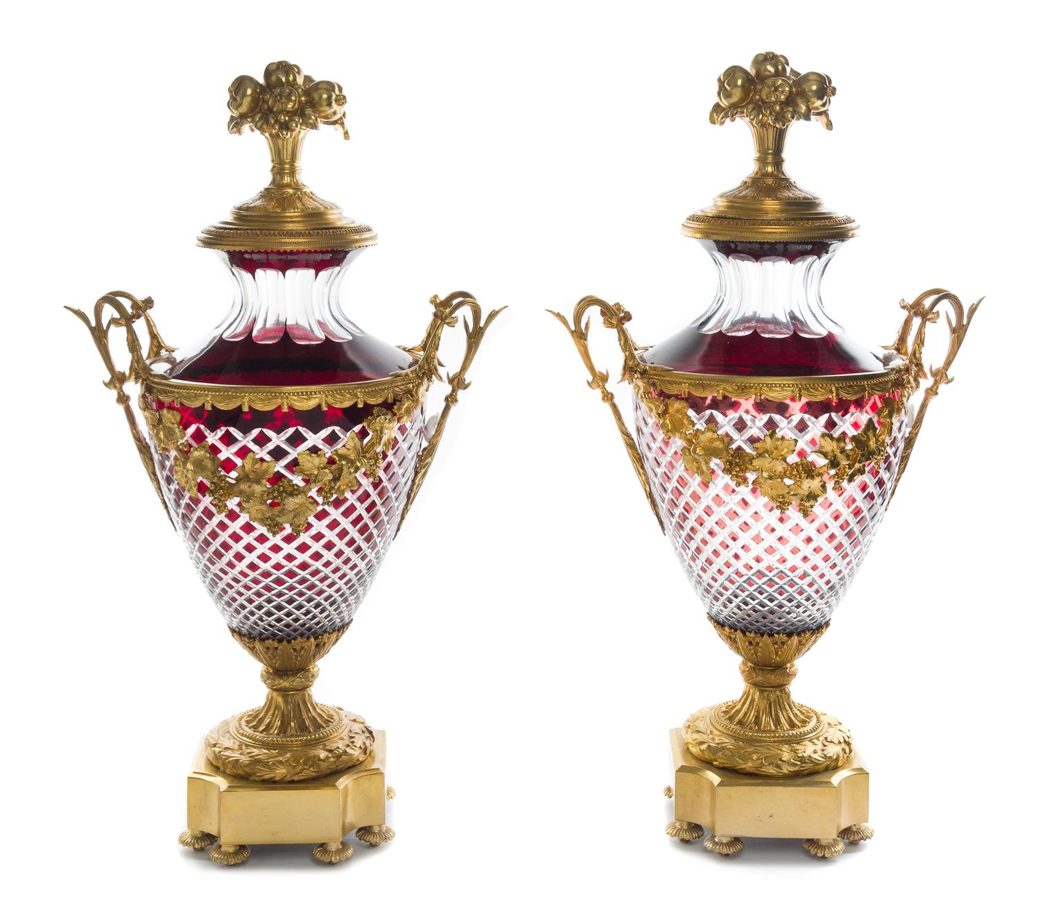 A Pair of Gilt Bronze Mounted Ruby Cut to Clear Glass Covered Urns Height 28 1/2 inches. — 20TH CENTURY