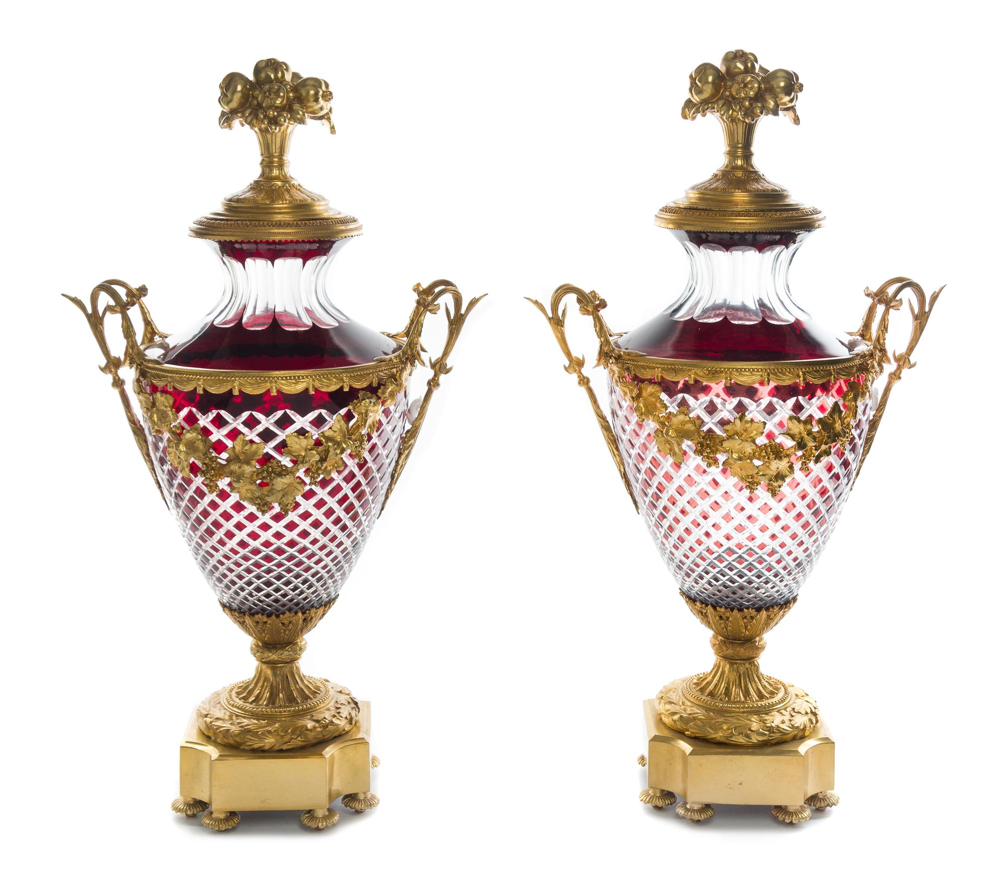 A Pair of Gilt Bronze Mounted Ruby Cut to Clear Glass Covered Urns Height 28 1/2 inches. — 20TH CENTURY
