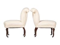 A Pair of Victorian Mahogany Roll Back Slipper Chairs