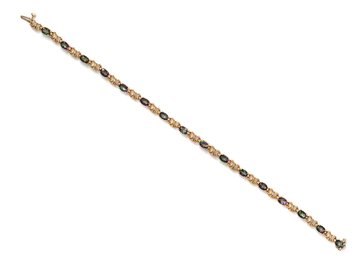 A Yellow Gold and Mystic Topaz Demi-Parure,