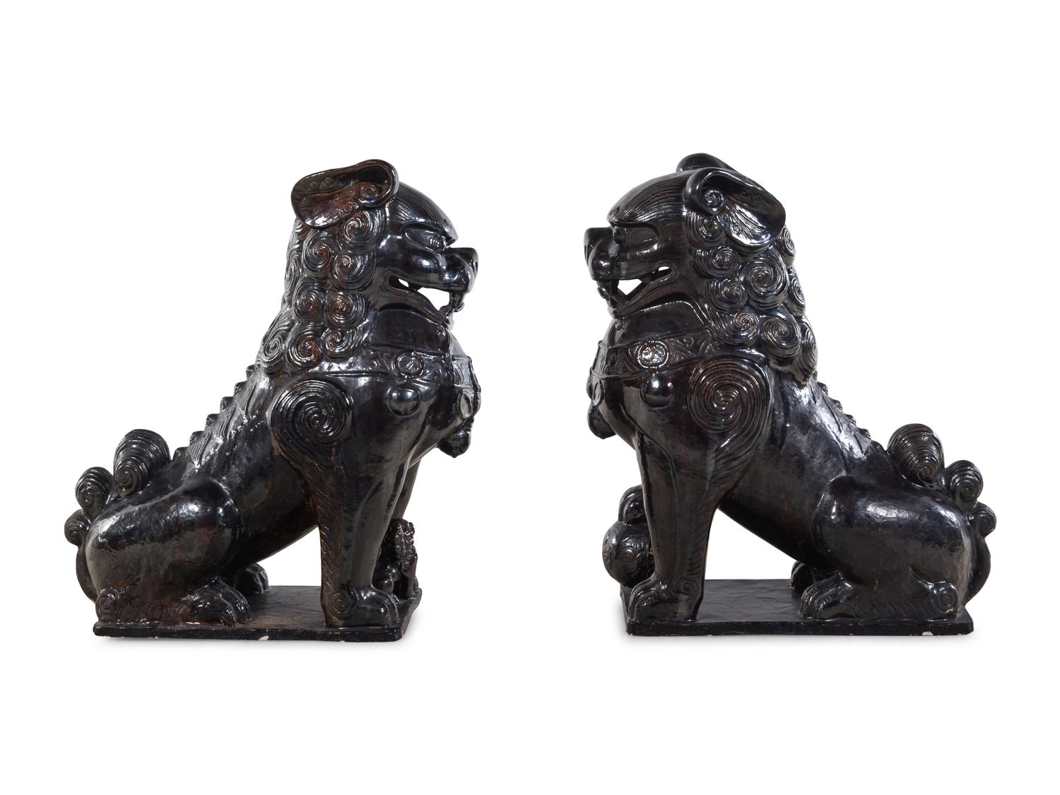 A Large Pair of Chinese Brown Glazed Stoneware Figures of Fu Lions