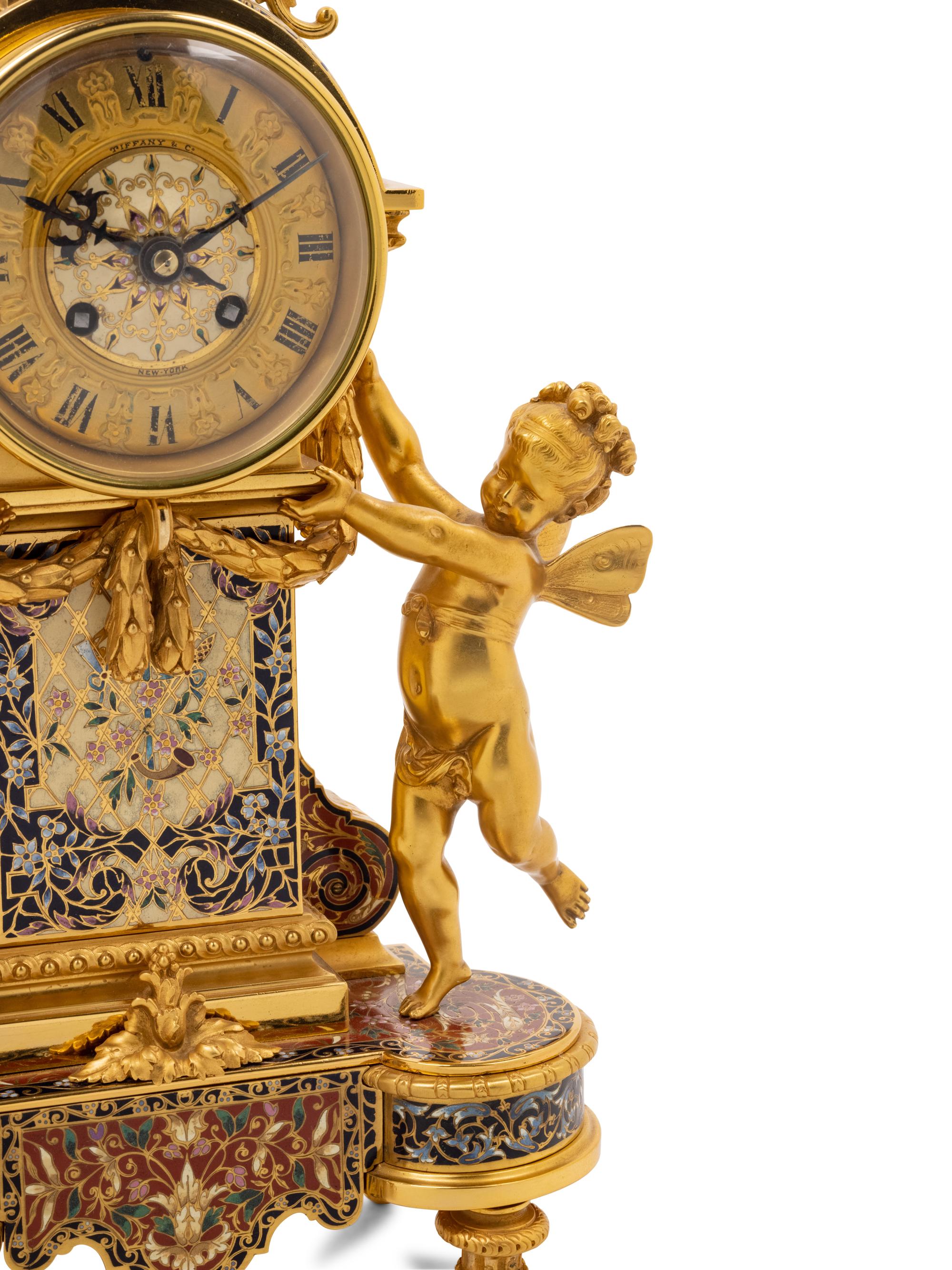 A French Gilt Bronze and Champlevé Clock Garniture Retailed by Tiffany and Co.