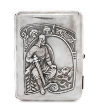 A Russian Silver Cigarette Case, Maker's mark obscured, Moscow, early 20th century, the lid worked to show an armored warrior seated on