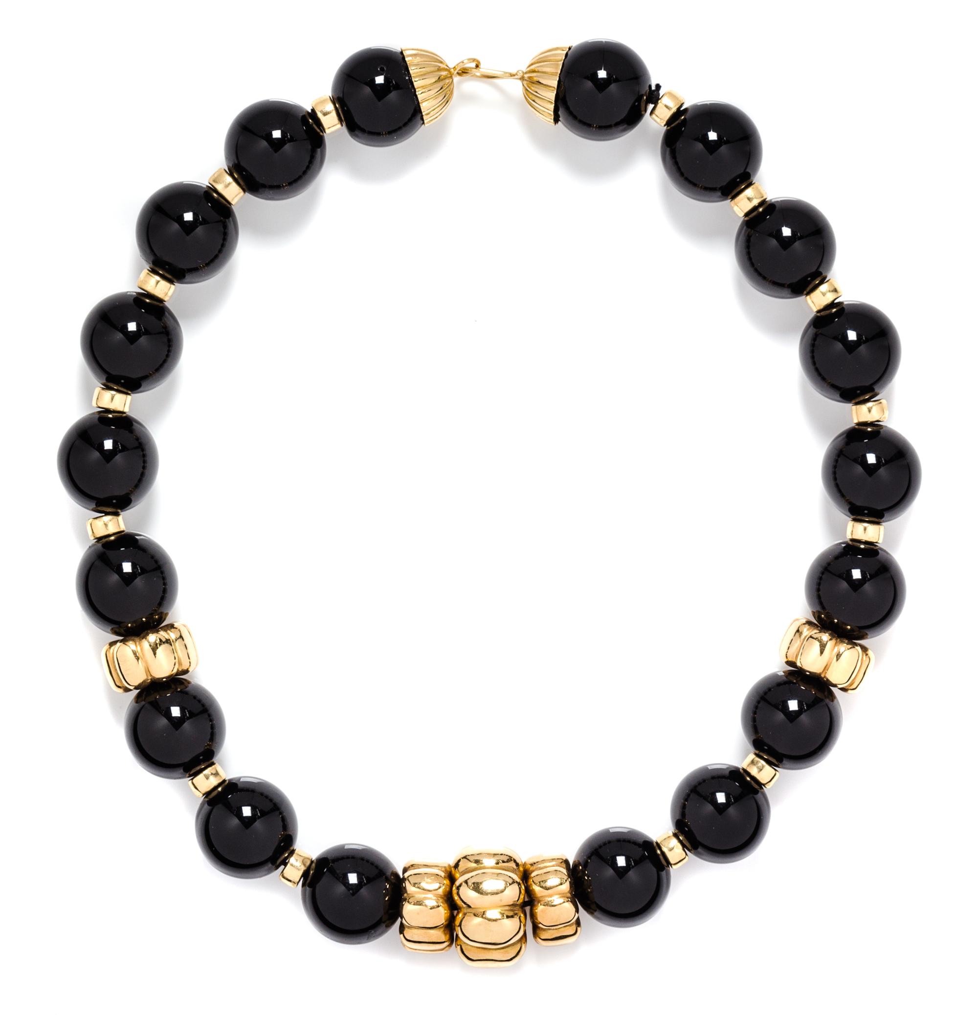 A Yellow Gold and Onyx Bead Necklace,
