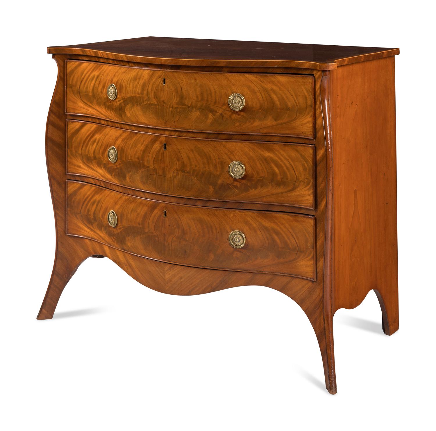 A George III Mahogany Serpentine Commode