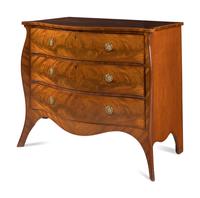 A George III Mahogany Serpentine Commode