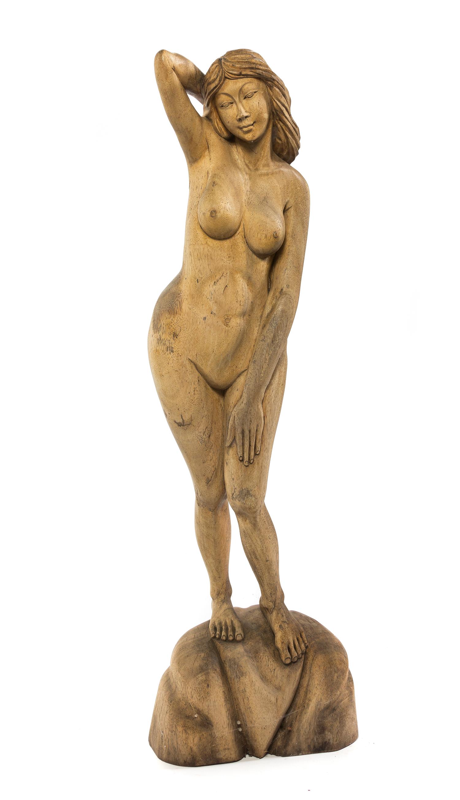 A Carved Wood Figure, Height 44 1/2 inches.