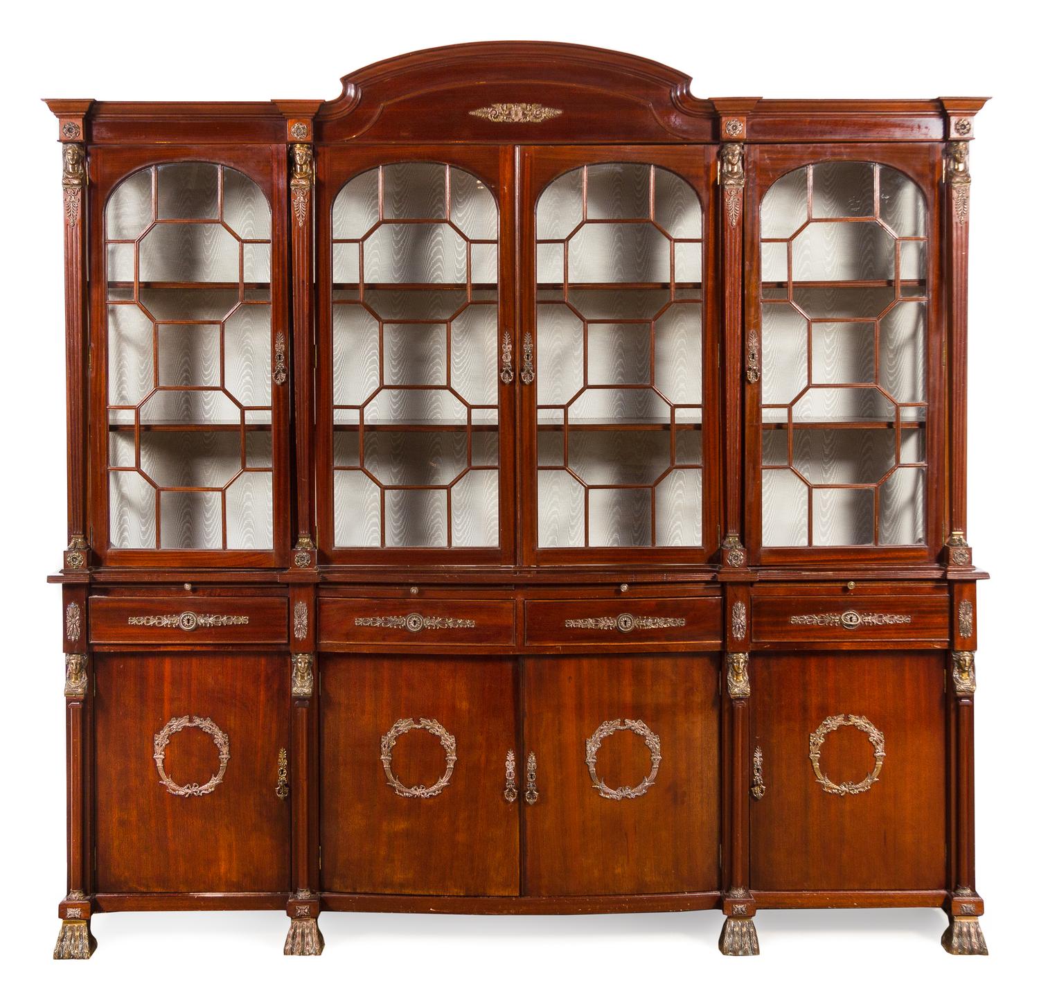 An Empire Style Gilt Metal Mounted Mahogany Breakfront Bookcase Height 88 x width 91 x depth 19 inches. — MID-20TH CENTURY