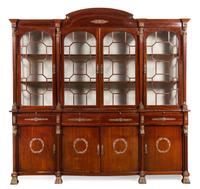 An Empire Style Gilt Metal Mounted Mahogany Breakfront Bookcase Height 88 x width 91 x depth 19 inches. — MID-20TH CENTURY
