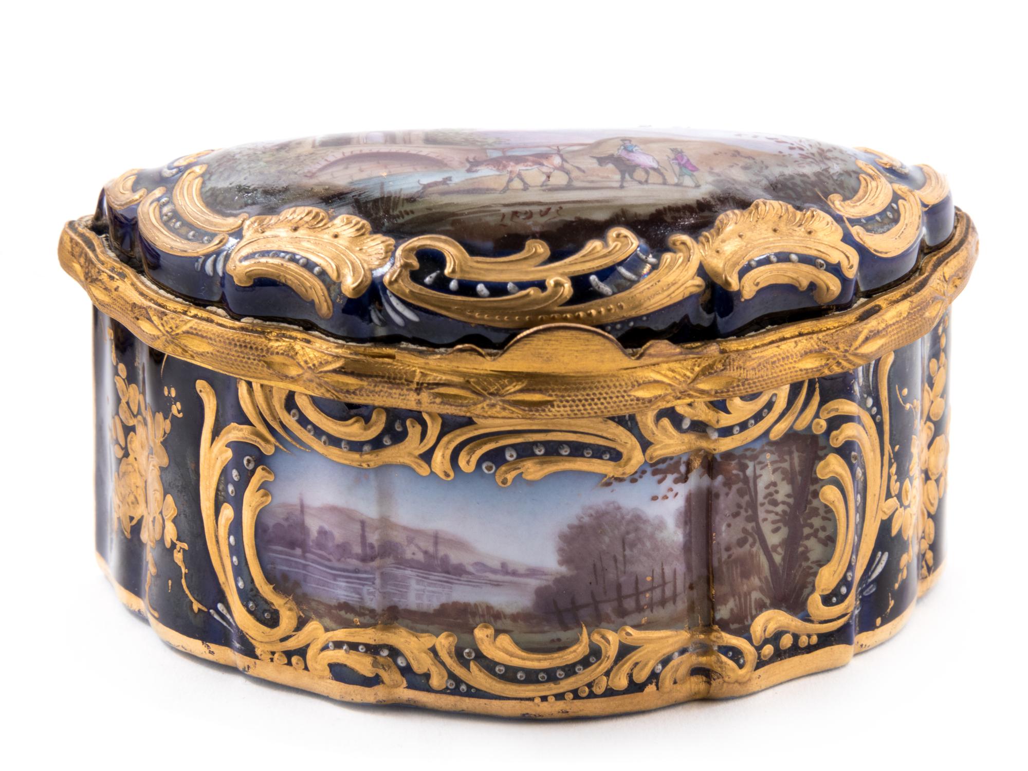 Three Sèvres Style Gilt Metal Mounted Painted and Parcel Gilt Porcelain Boxes