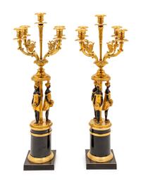 A Pair of Empire Style Gilt and Patinated Metal Figural Candelabra